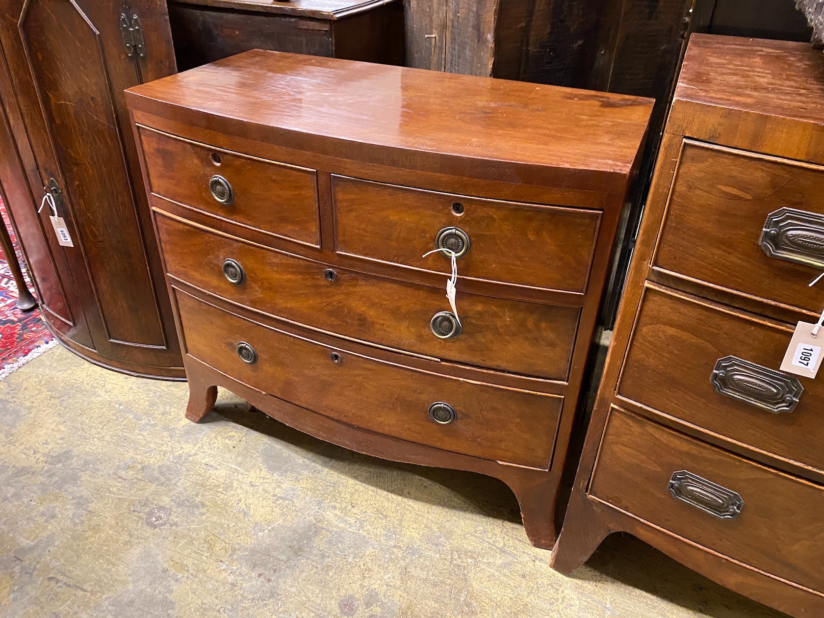 A small Regency mahogany bow front chest of drawers, width 83cm, depth 44cm, height 75cm